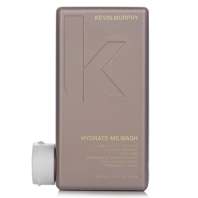 Kakadu Plum-infused moisturizing shampoo for color-treated hair, enhancing shine, softness, and manageability. Sulfate-free.