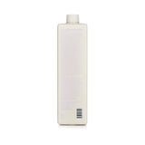 Luxurious 1000ml blonde-enhancing shampoo with nourishing butters and keratin for shiny, vibrant hair.