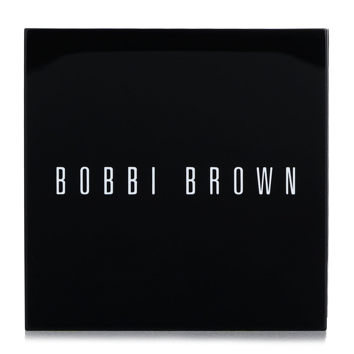 Bobbi Brown Brightening Brick in #06 Cranberry, a lightweight blusher for a radiant, sun-kissed glow on cheeks.