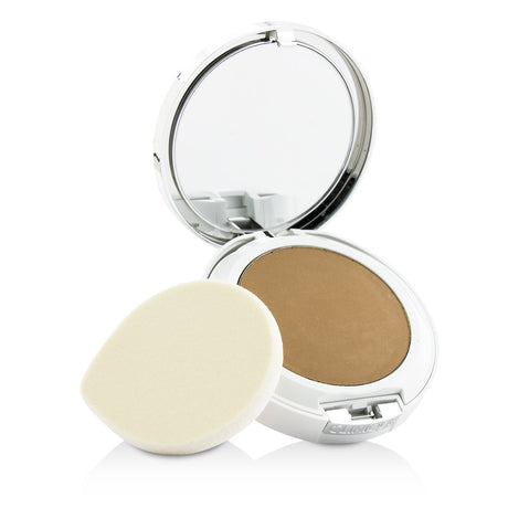 Clinique's Beyond Perfecting Powder Foundation + Concealer in #15 Beige offers lightweight, full coverage for a natural, flawless look.