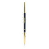 Navy kohl eyeliner by Sisley with sharpener and blender for smooth application and precise lash lines, ideal for any look.