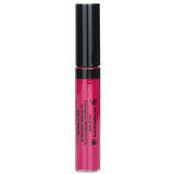 Close-up of Laura Geller's #Berry Crush lip gloss, showcasing its vibrant color and high-shine, non-sticky formula.