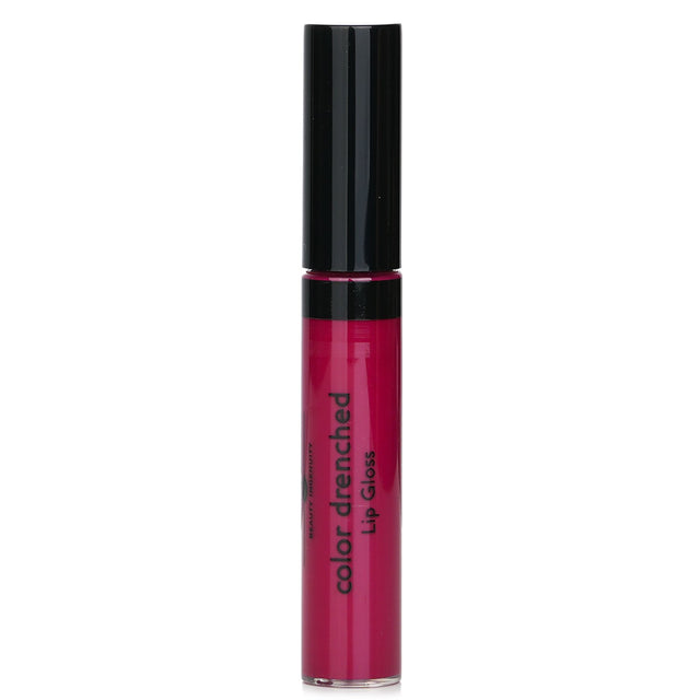 Laura Geller's Berry Crush lip gloss boasts vibrant color, high shine, and a comfortable, non-sticky formula with a coffee scent.