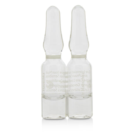 Dr. Hauschka Sensitive Care Conditioner ampules for sensitive skin with calming botanicals and gemstone extracts, soothing redness and irritation.