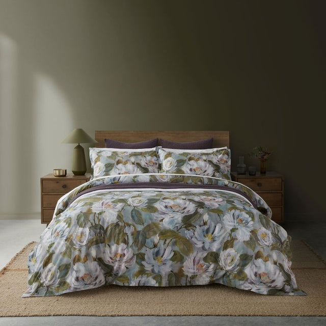 Watercoloured floral King Single duvet cover set from BAKSANA, featuring OEKO-TEX® certified cotton and cool blue sheet backing.