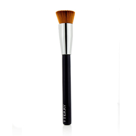 Professional By Terry foundation brush featuring soft bristles and a unique hollow center for versatile, flawless makeup application.