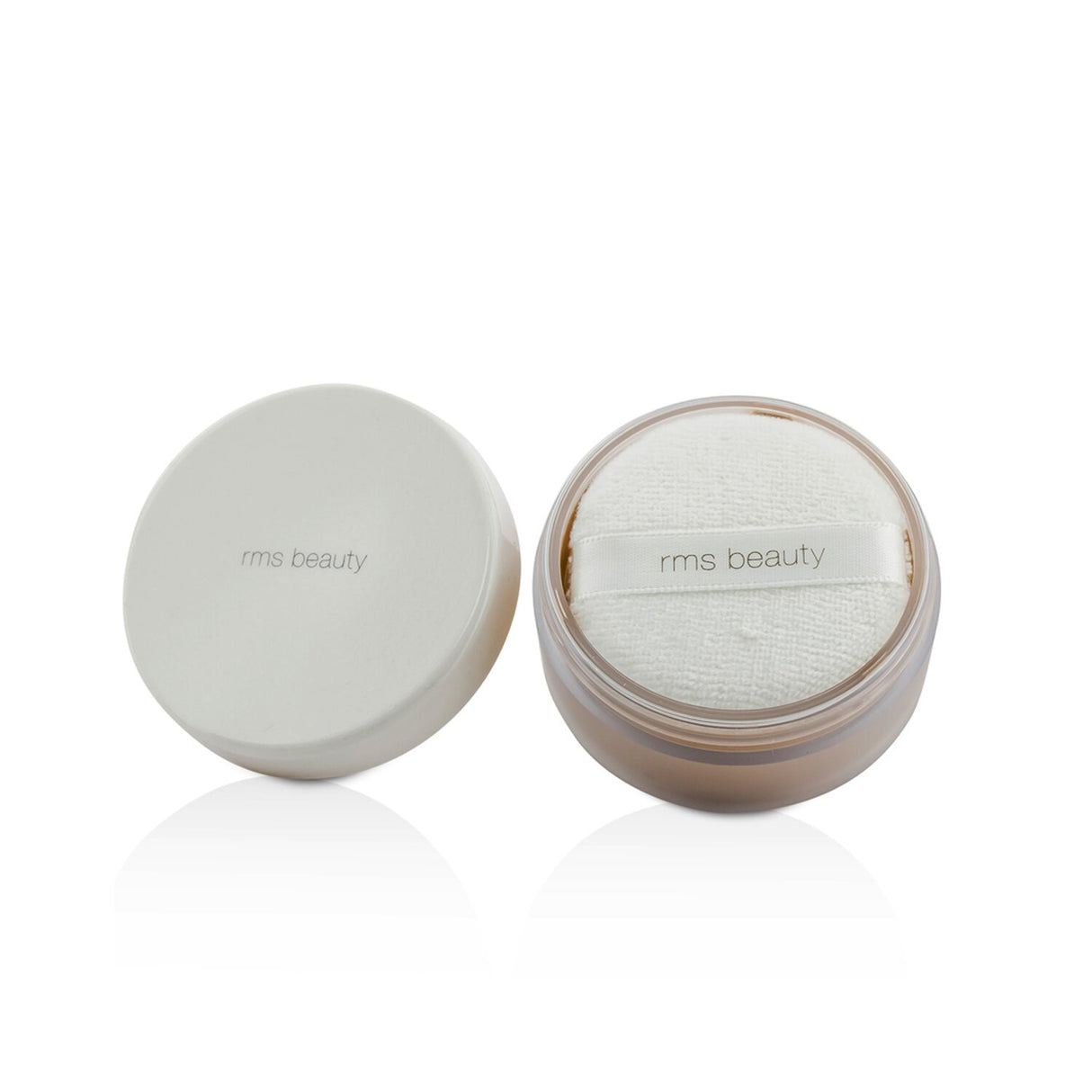 RMS Beauty Tinted "Un" Powder #3-4, a 9g lightweight powder for a flawless, matte finish and luminous glow. Clean ingredients.