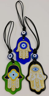 Handcrafted Turkish glass hamsa wall hangings with evil eye, assorted designs and colors, ideal for home decor.