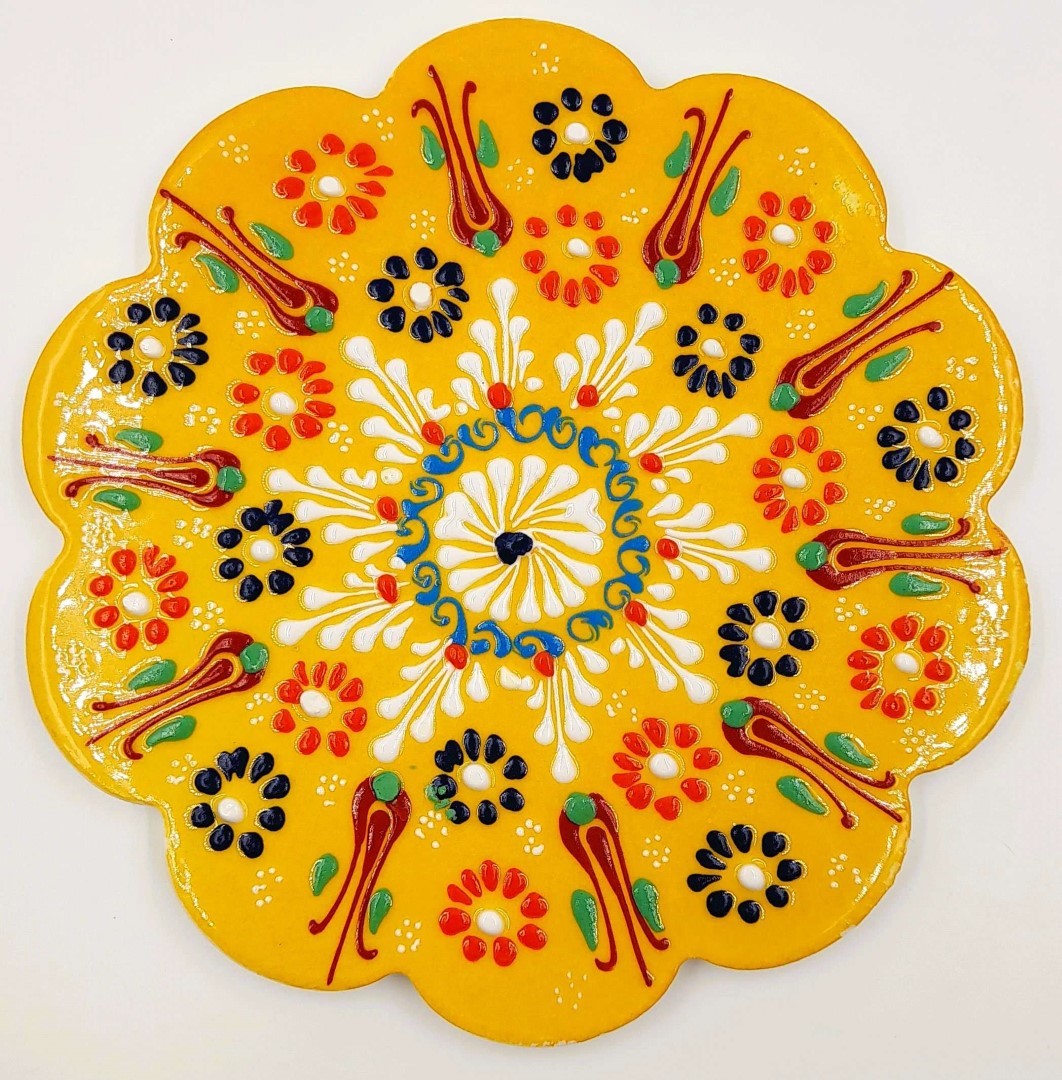 Set of three 18cm Turkish handpainted trivets featuring unique designs and vibrant colors for table protection and decor.