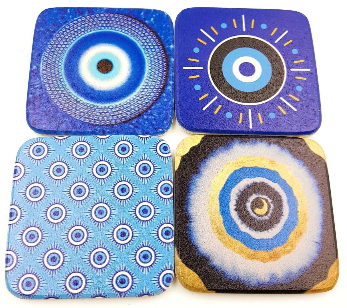 Handmade 9cm Evil Eye coasters set of 2, showcasing vibrant assorted designs with protective symbolism for home decor.