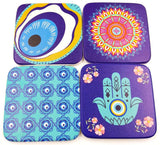 Handmade 9cm Evil Eye coasters in assorted designs, offering elegance and cultural protection for your home decor.