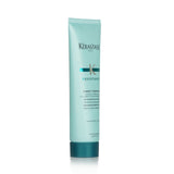Kerastase Resistance Ciment Thermique strengthens and protects damaged hair during blow-drying, leaving it soft, shiny, and healthy.