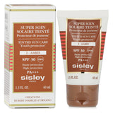 Tinted facial cream with SPF 30, nourishes while providing sun protection, ideal for warm amber skin tones.