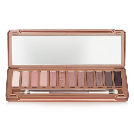 Urban Decay Naked 3 Eyeshadow Palette featuring 12 blendable shades and a dual-ended brush for versatile eye looks.