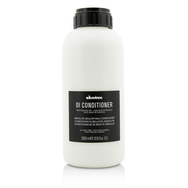 Intensely nourishing Davines OI Conditioner with Roucou Oil for softer, shinier, and stronger hair, suitable for all hair types.