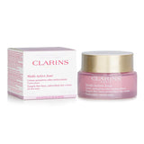 Clarins Multi-Active Day Cream for all skin types, targets fine lines with antioxidants for youthful, radiant skin.