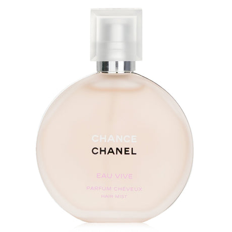 Chanel Chance Eau Vive Hair Mist in a 35ml bottle, infusing hair with floral-zesty fragrance and Pro-vitamin B5 for health.