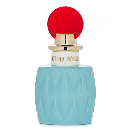 Miu Miu Eau De Parfum Spray in a luxurious flacon, featuring floral and spicy notes for modern young women.