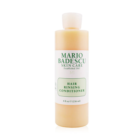 Mario Badescu Hair Rinsing Conditioner in 236ml, a lightweight detangler for all hair types, enriched with tropical fruit extracts.