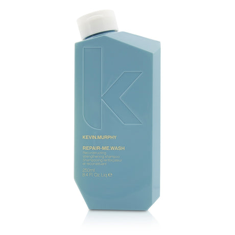 Kevin.Murphy Repair-Me.Wash shampoo in 250ml bottle, enriched with Silk Amino Acids for strengthening and revitalizing hair.