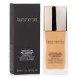 Laura Mercier Candleglow Foundation #4W2 Chai, 30ml, offers lightweight, luminous coverage for a radiant, natural complexion.