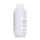 Davines Love Hair Smoother in 150ml, a leave-in treatment for coarse or frizzy hair, enriched with Minuta Olive extract.