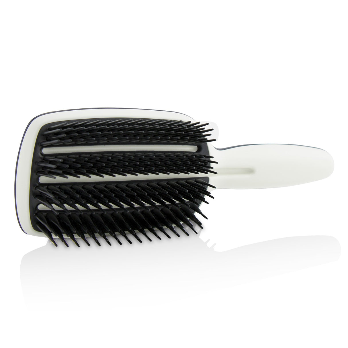 Tangle Teezer paddle brush designed for quick blow-drying, reducing frizz and enhancing shine for medium to long hair.