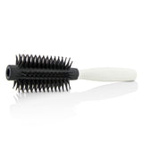 Innovative round brush for quick blow-drying, adding volume and shine to short to medium hair without tugging or pulling.