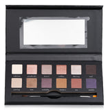 Vibrant YBF Beauty Rock The Croc Eyeshadow Palette with 12 shades and a double-ended brush for stunning eye looks.