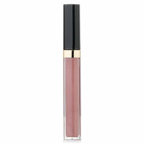 Chanel Rouge Coco Gloss #722 Noce Moscata: luxurious, moisturizing gloss with a plumping, sheer finish and dual-sided applicator.