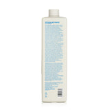 Luxurious 1000ml conditioner with Shea Butter and Aloe Vera for repairing and nourishing damaged hair. Paraben-free.