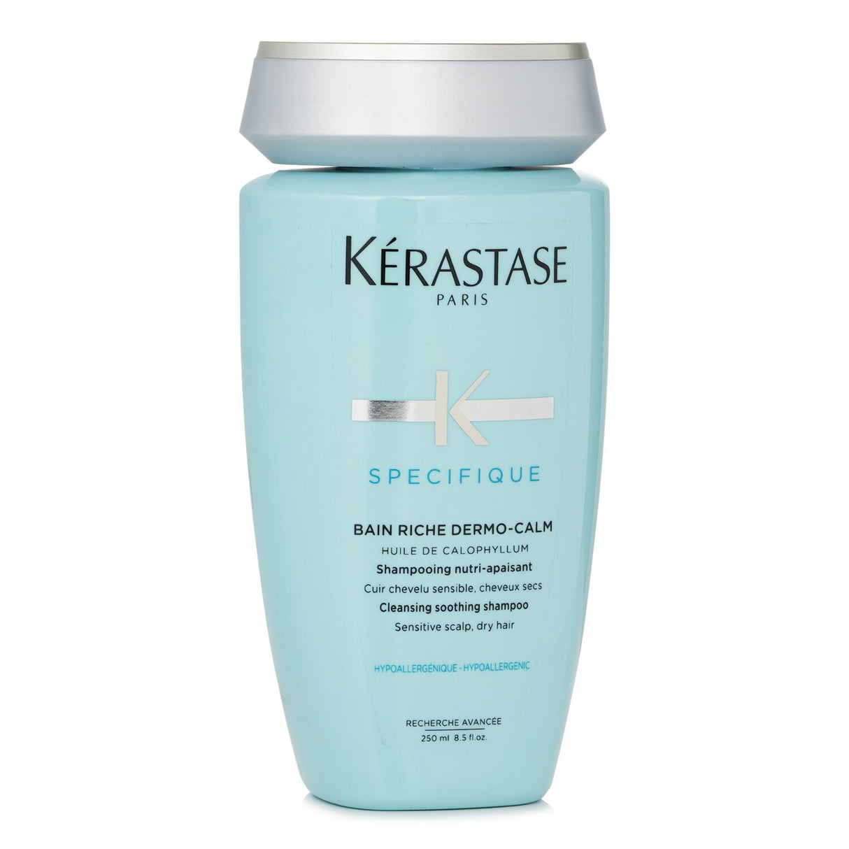 Kerastase Dermo-Calm Shampoo: creamy, soothing formula for sensitive scalps, nourishing dry hair with Calophyllum Oil and menthol.