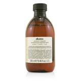 Davines Alchemic Shampoo in #Golden, ideal for enhancing and preserving golden blonde hair with natural ingredients.