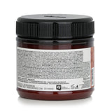 Copper-tinted conditioner for enhancing and smoothing natural or colored hair, enriched with milk proteins for shine.