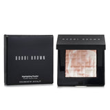 High-impact Bobbi Brown Highlighting Powder in #Pink Glow adds shimmering pink highlights with a silky texture for a luminous finish.