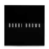 Bobbi Brown Highlighting Powder #Pink Glow in a sleek compact, offers luminous pink highlights for a radiant, youthful finish.