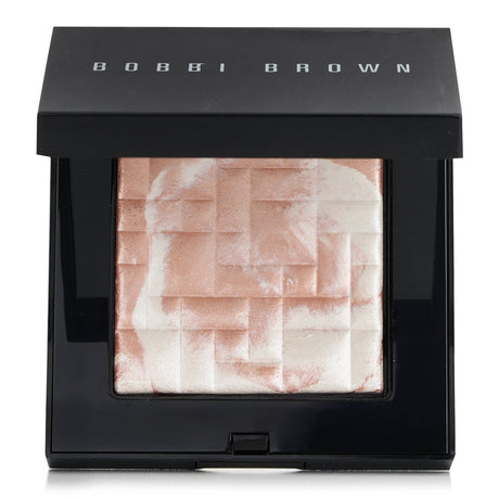 Bobbi Brown Highlighting Powder in #Pink Glow offers luminous, shimmering highlights for a radiant complexion in a mirrored compact.