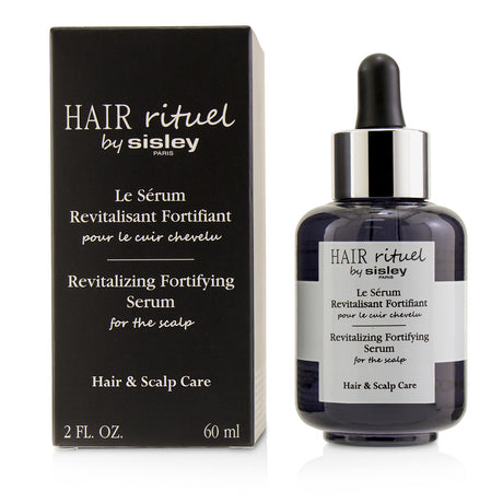 Revitalizing fortifying serum for scalp health, enhancing hair vitality with a non-greasy, nourishing formula.