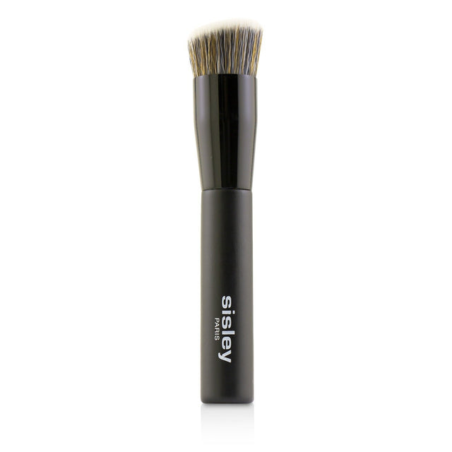 Sisley foundation brush with ultra-soft bristles, designed for flawless blending of liquid and powder foundations.