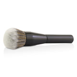 Luxurious Sisley Pinceau Poudre brush with ultra-soft bristles for flawless application of loose and compact powders.