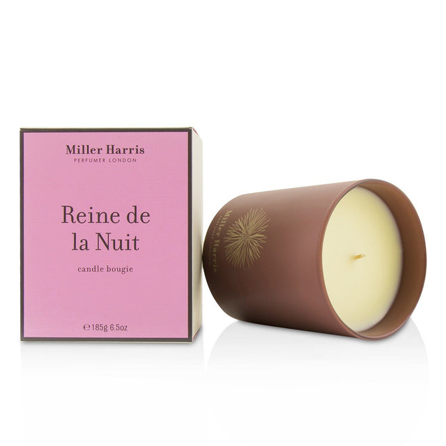 Miller Harris Reine De La Nuit scented candle (185g) offering a luxurious, powdery fragrance with a 40-hour burn time.