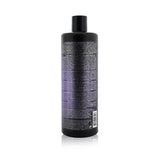 Tigi Catwalk Fashionista Violet Conditioner in a 750ml bottle, designed to enhance blonde tones and combat brassiness.