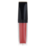 Intense matte liquid lipstick in #302 Juiced Up by Estee Lauder, offering vibrant color and smooth application.