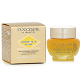 L'Occitane Immortelle Divine Eye Balm in a 15ml jar, designed to rejuvenate and hydrate the delicate eye area, reducing signs of aging.