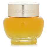 Luxurious 15ml eye balm with organic Immortelle oil, reducing wrinkles and dark circles for youthful, radiant eyes.