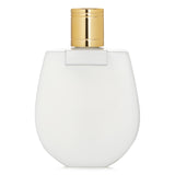 Luxurious Chloe Nomade Perfumed Body Lotion, 200ml, offers hydration and a captivating scent for soft, smooth skin.