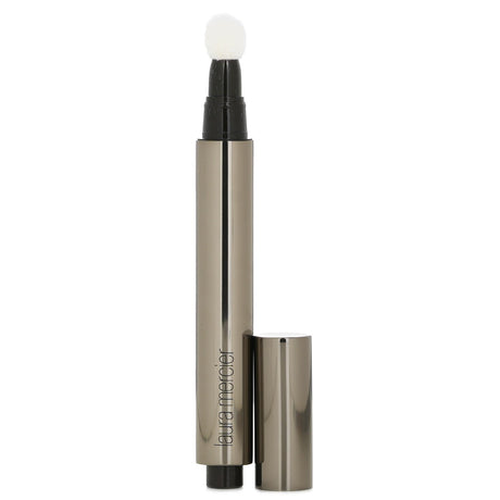 Laura Mercier Candleglow Concealer and Highlighter #6, a dual-purpose makeup with a velvety texture for a radiant, flawless complexion.