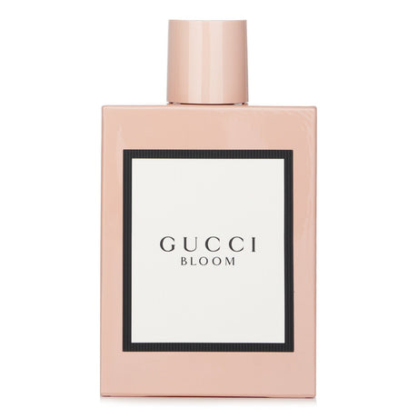 Gucci Bloom Eau De Parfum Spray in elegant 100ml bottle, featuring floral notes for a luxurious feminine scent.