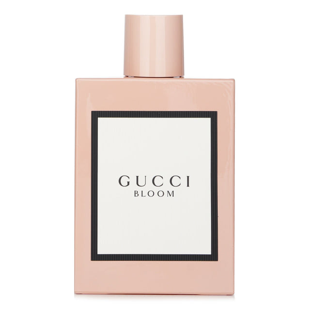 Gucci Bloom Eau De Parfum Spray in elegant 100ml bottle, featuring floral notes for a luxurious feminine scent.