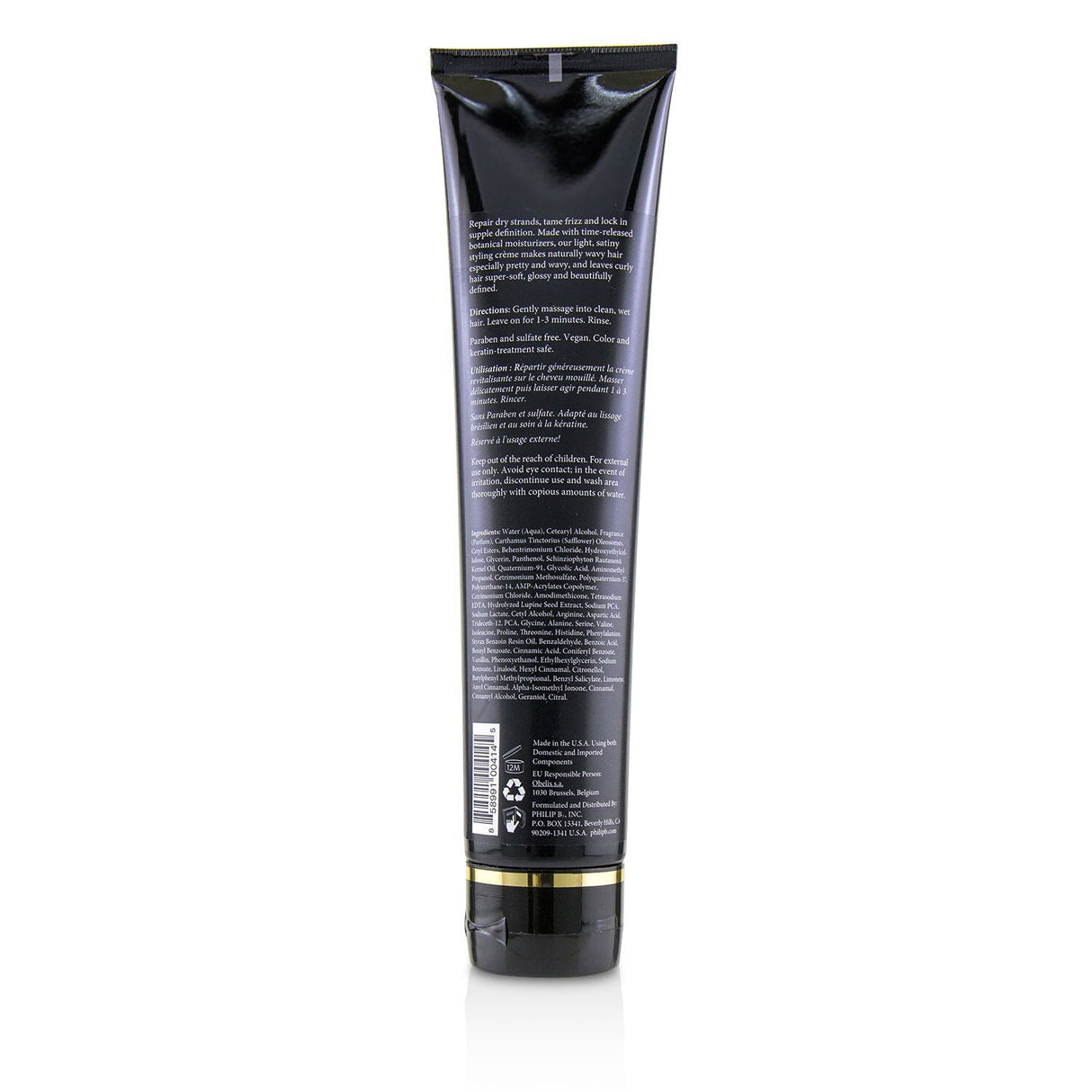 Lightweight leave-in conditioner for wavy hair, enhances curls, tames frizz, adds shine, and prevents color fading.